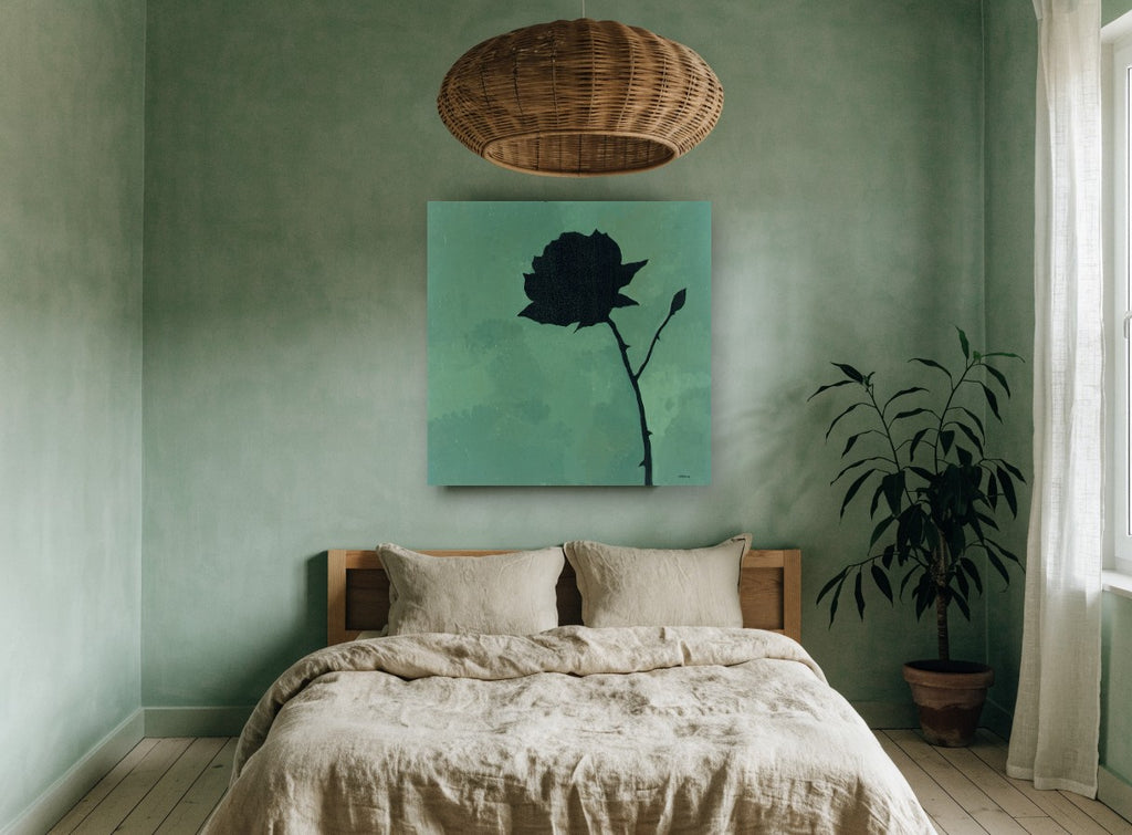 Black Rose Silhouette floral canvas print on the wall of a bedroom