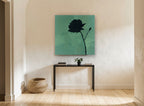 Black Rose Silhouette floral canvas print on the wall of a hallway
