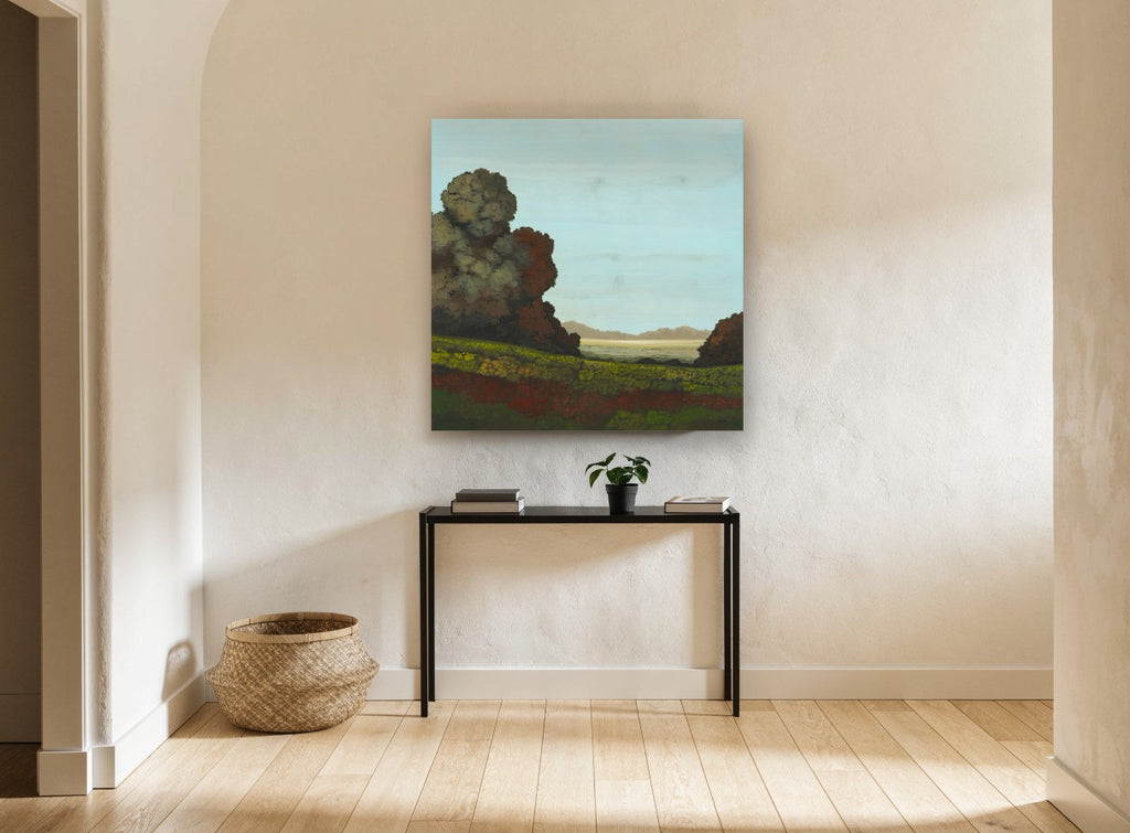 Rust Trees Over Meadow floral canvas print on the wall of a hallway