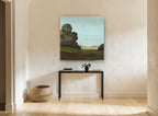 Rust Trees Over Meadow floral canvas print on the wall of a hallway