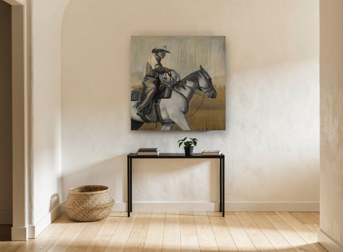 Cowboy on Grey Horse vintage canvas print on the wall of a hallway