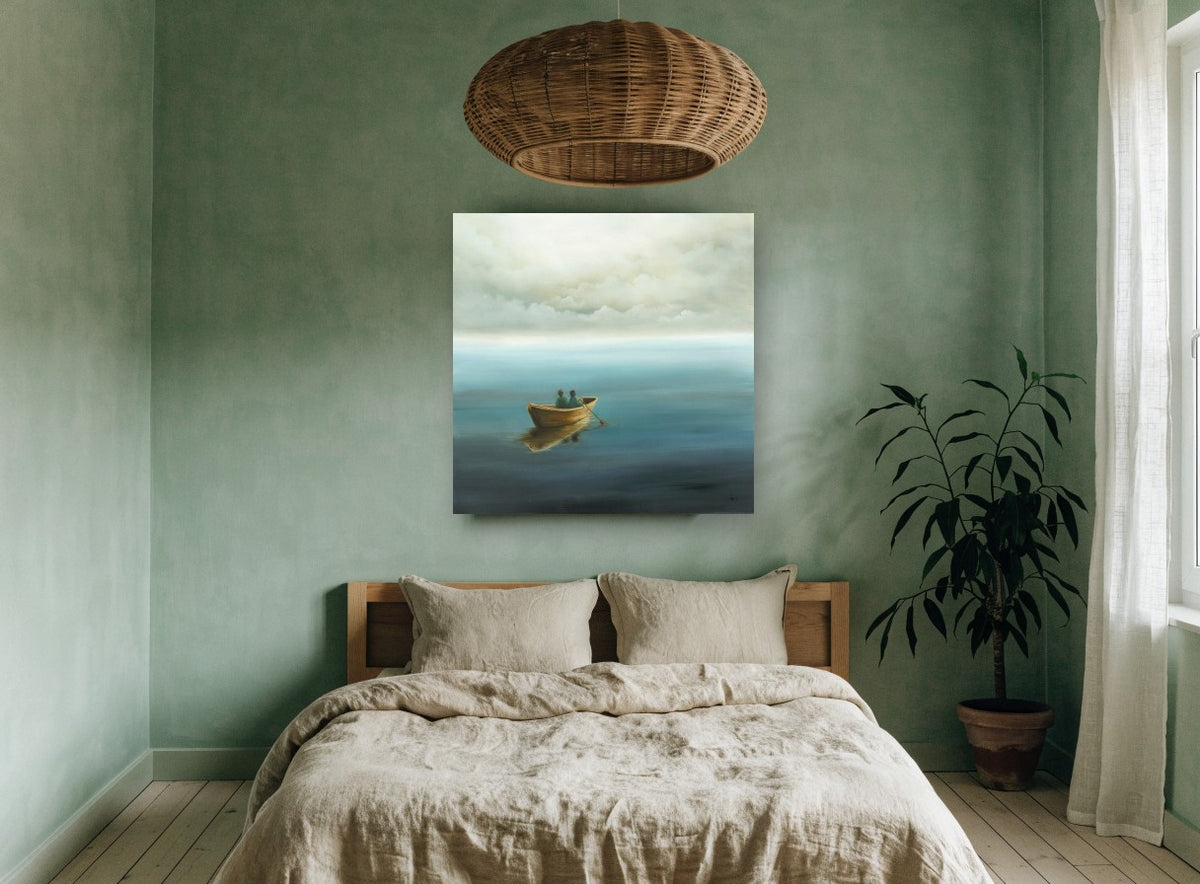 Two in a Rowboat coastal canvas print on the wall of a bedroom