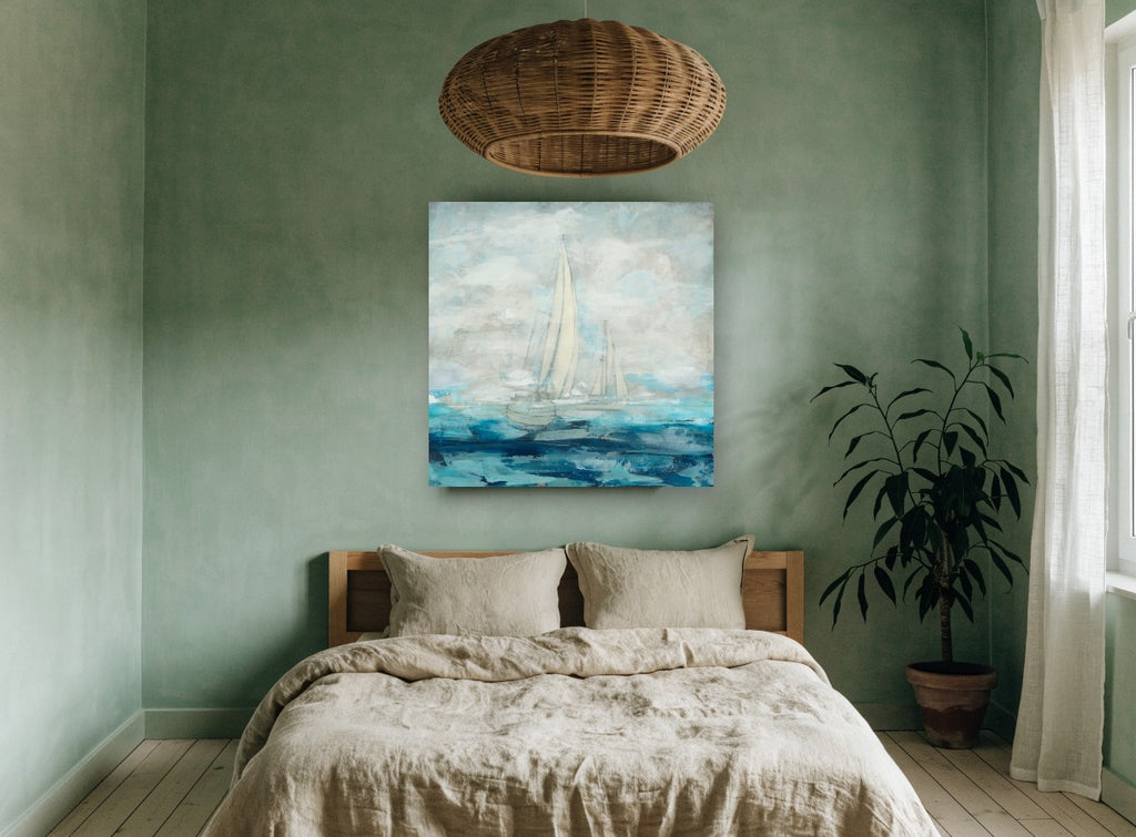 Sails in Soft Blue coastal canvas print on the wall of a bedroom