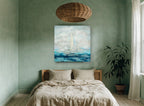 Sails in Soft Blue coastal canvas print on the wall of a bedroom