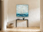 Sails in Soft Blue coastal canvas print on the wall of a hallway