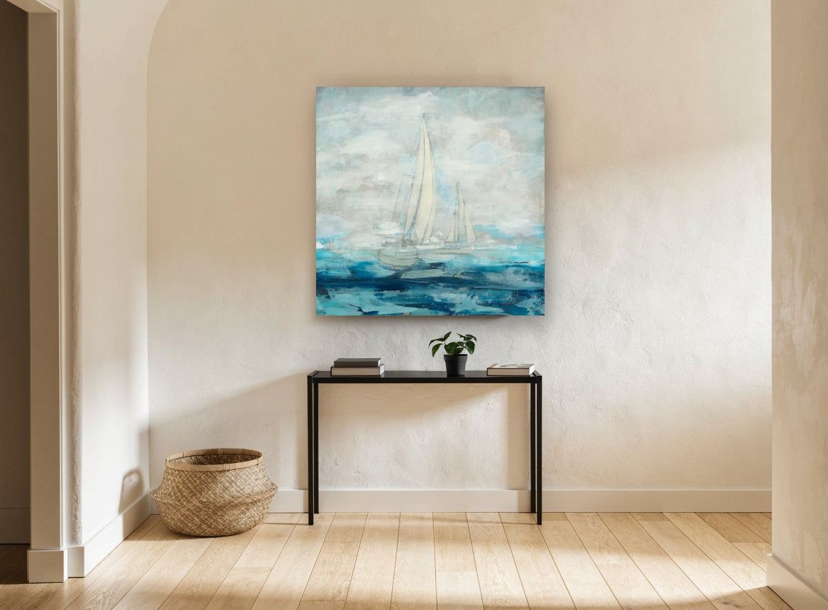 Sails in Soft Blue coastal canvas print on the wall of a hallway