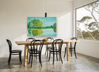 Teal Lake Reflections landscape canvas print on the wall of a dining room