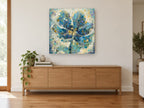 Blue Mosaic Bloom floral canvas print on the wall of a living room above a sideboard