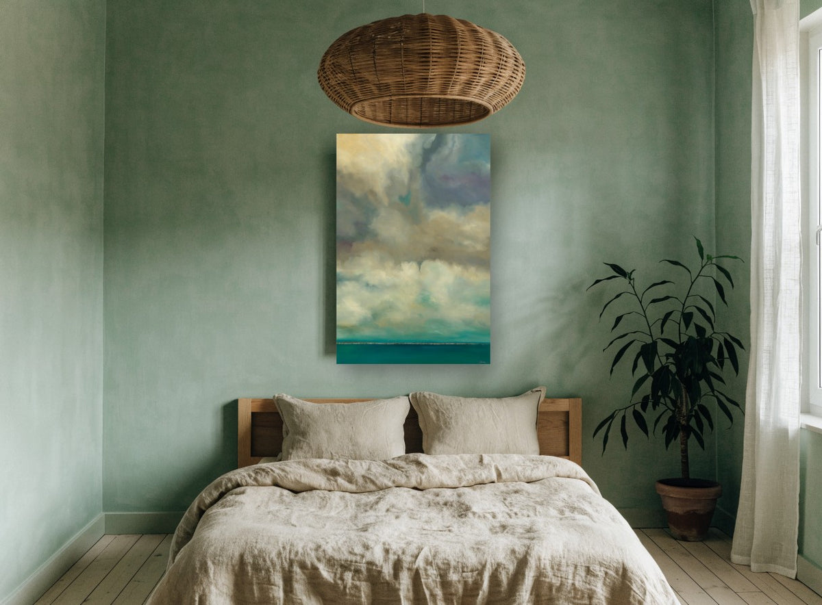 Teal Horizon Cloudscape coastal canvas print on the wall of a bedroom