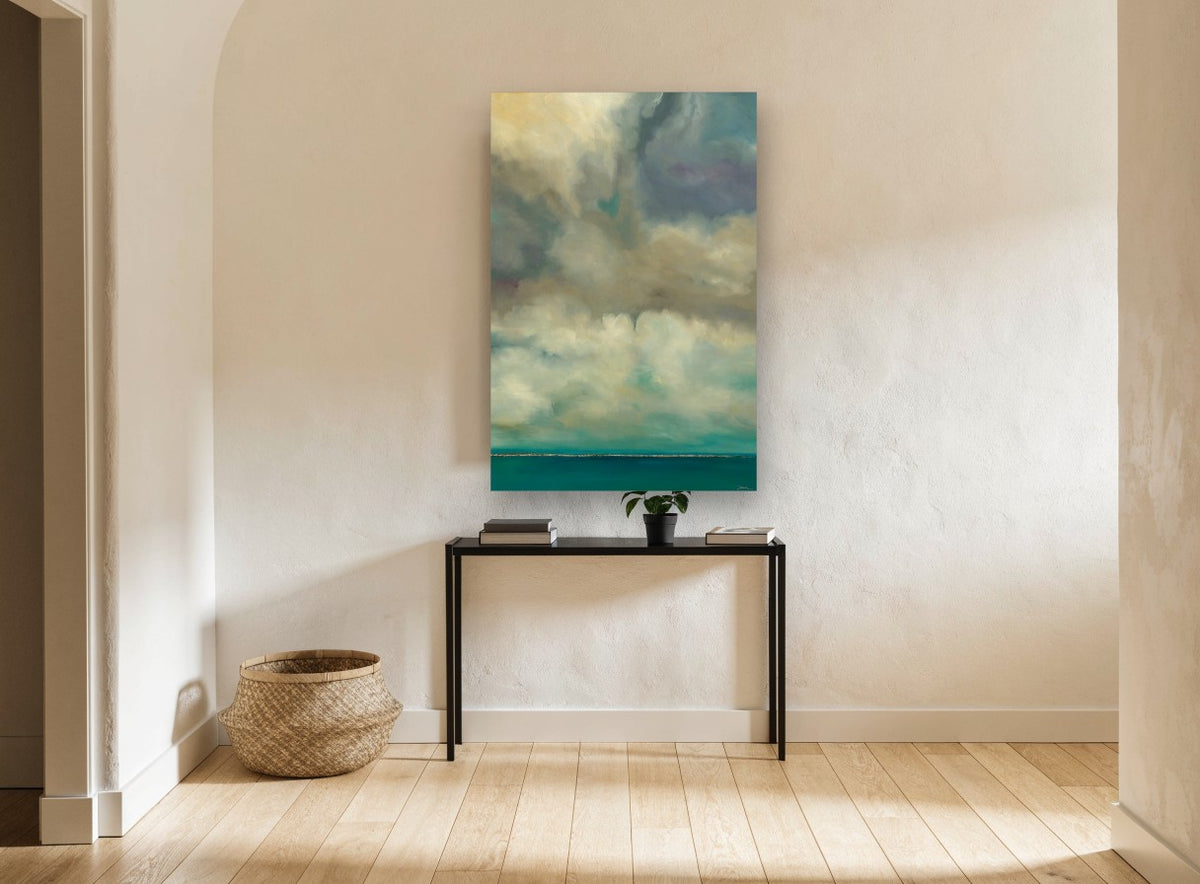 Teal Horizon Cloudscape coastal canvas print on the wall of a hallway