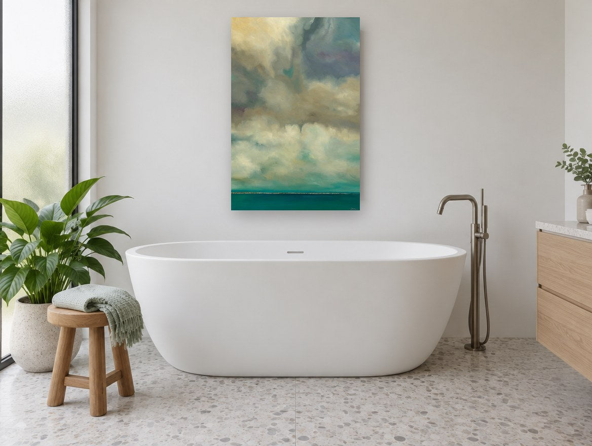 Teal Horizon Cloudscape coastal canvas print on the wall of a bathroom