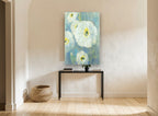 Pale Poppies on Blue floral canvas print on the wall of a hallway
