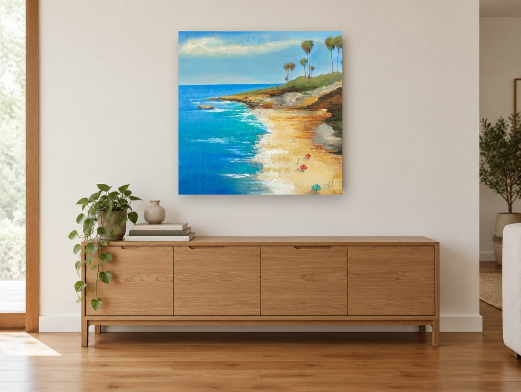 Palm Headland Cove coastal canvas print on the wall of a living room above a sideboard