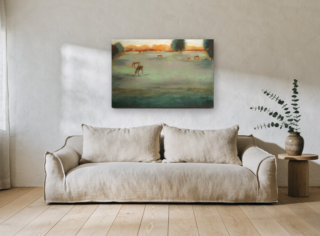 Grazing Horses at Dusk landscape canvas print on the wall of a living room