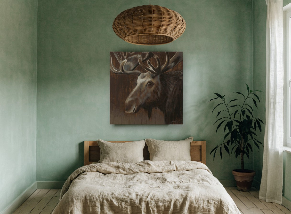 Brooding Bull Moose animal canvas print on the wall of a bedroom