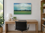 Teal Sky Tree Line landscape canvas print on the wall of a study