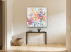 Blue Jar Poppy Bouquet floral canvas print on the wall of a hallway