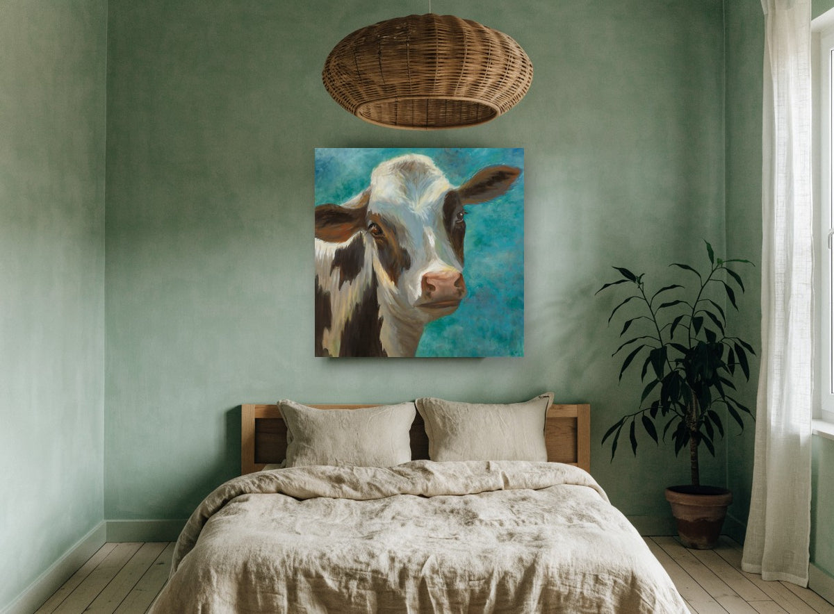 Teal Sky Heifer animal canvas print on the wall of a bedroom