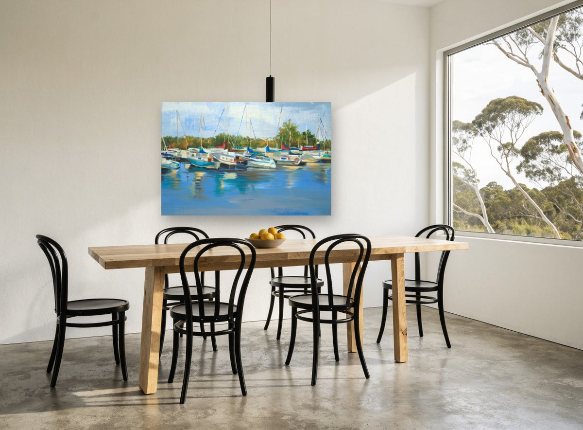 Marina Morning Reflections coastal canvas print on the wall of a dining room