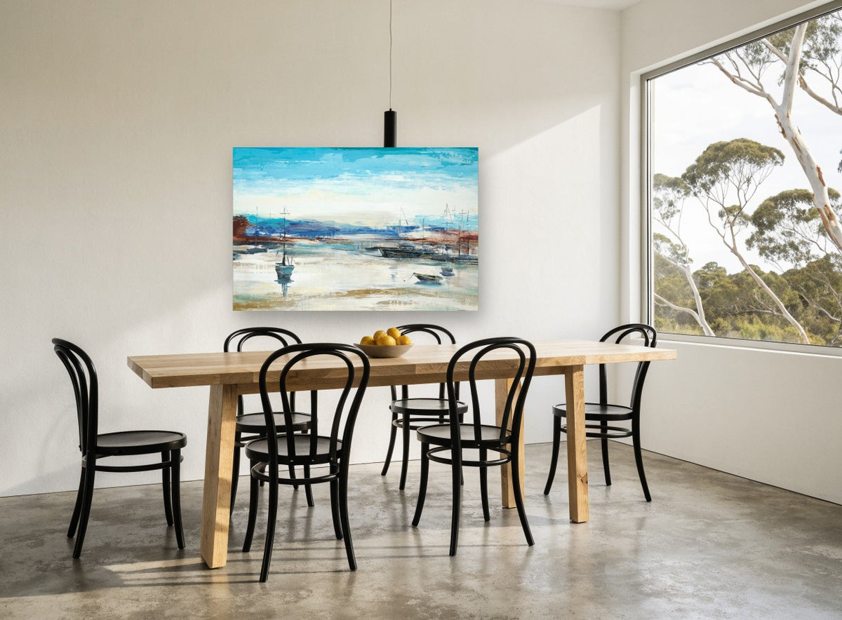 Low Tide Moorings coastal canvas print on the wall of a dining room