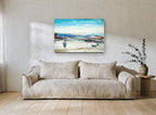 Low Tide Moorings coastal canvas print on the wall of a living room