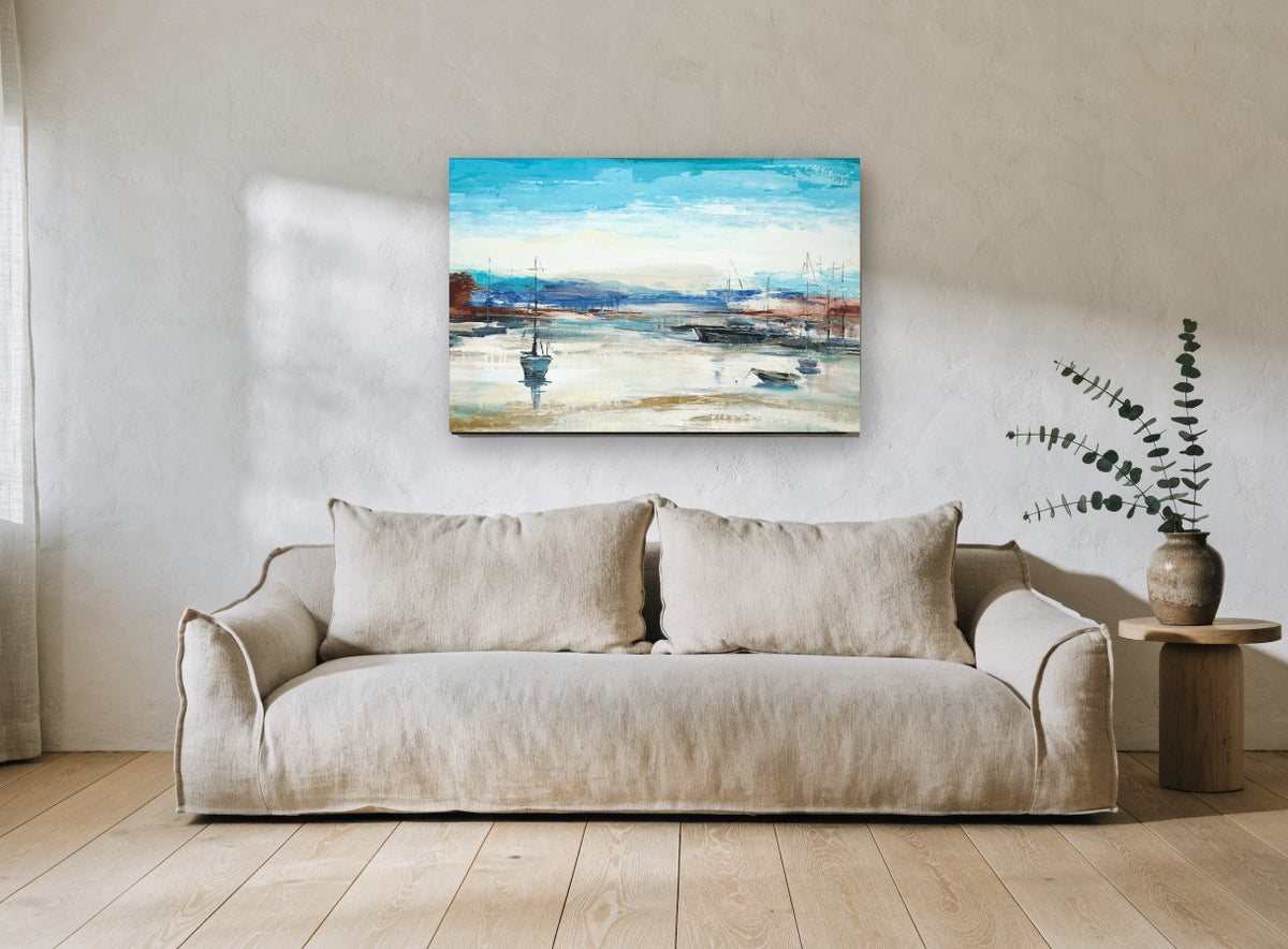 Low Tide Moorings coastal canvas print on the wall of a living room