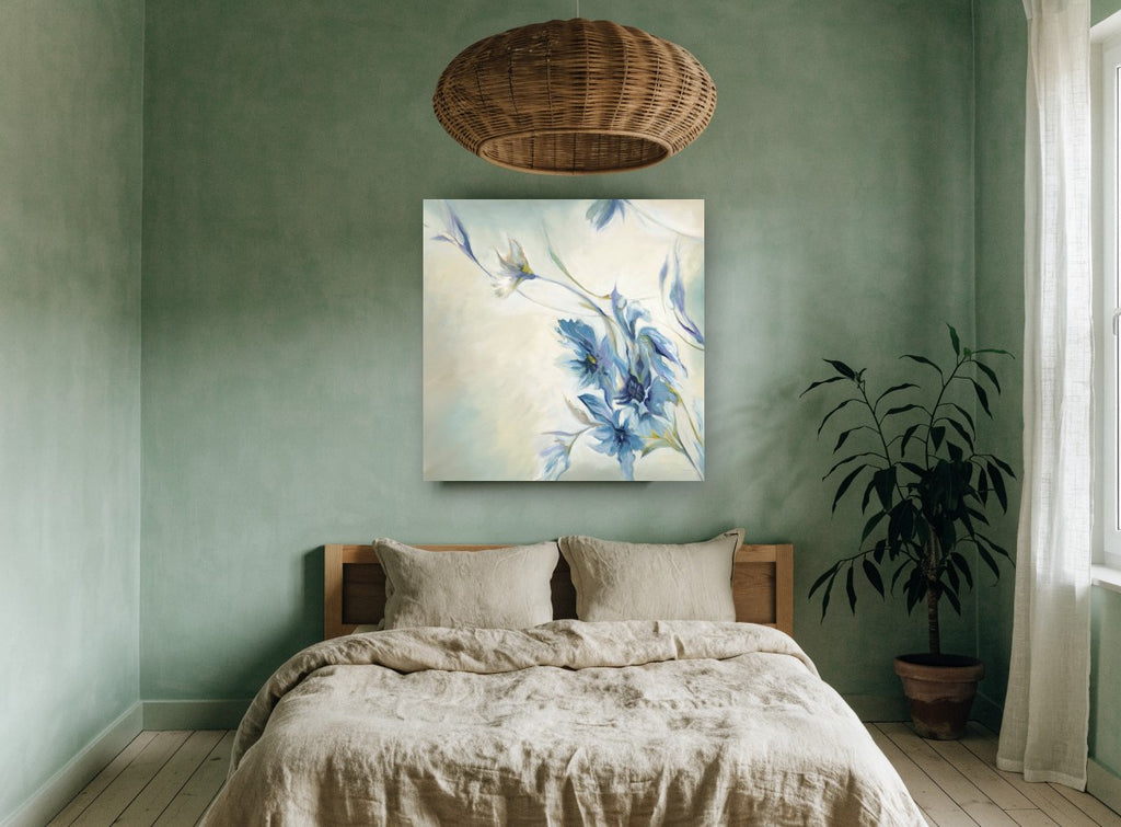 Windswept Blue Blooms floral canvas print on the wall of a bedroom