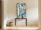Hanging Jewel Vines floral canvas print on the wall of a hallway