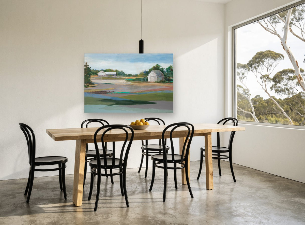 Barns Across Quiet Fields landscape canvas print on the wall of a dining room