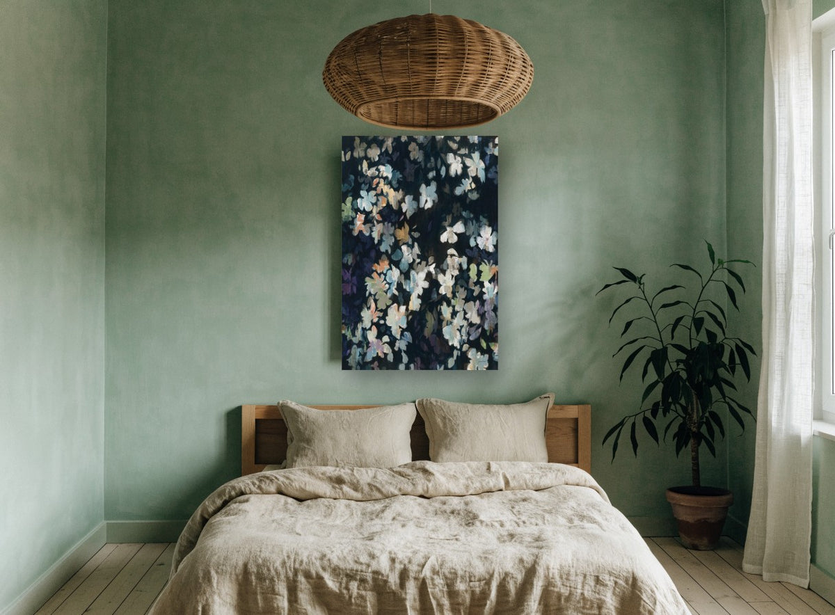 Midnight Petal Drift floral canvas print on the wall of a bedroom