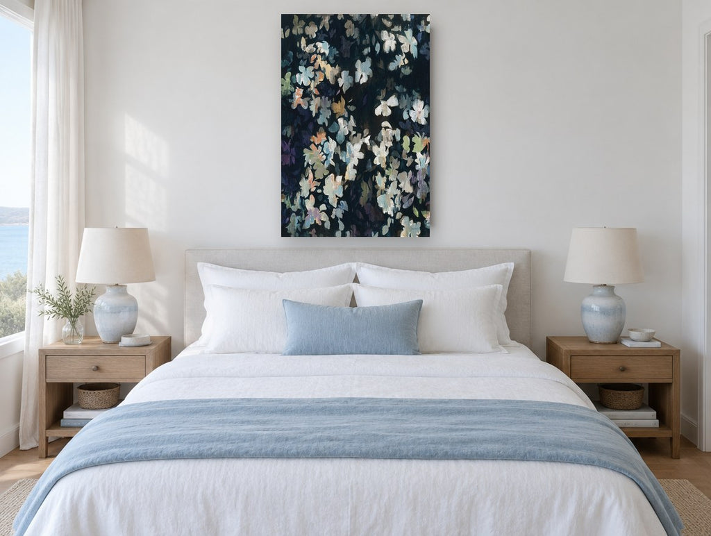 Midnight Petal Drift floral canvas print on the wall of a coastal bedroom