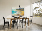 Golden Cove Shoreline coastal canvas print on the wall of a dining room