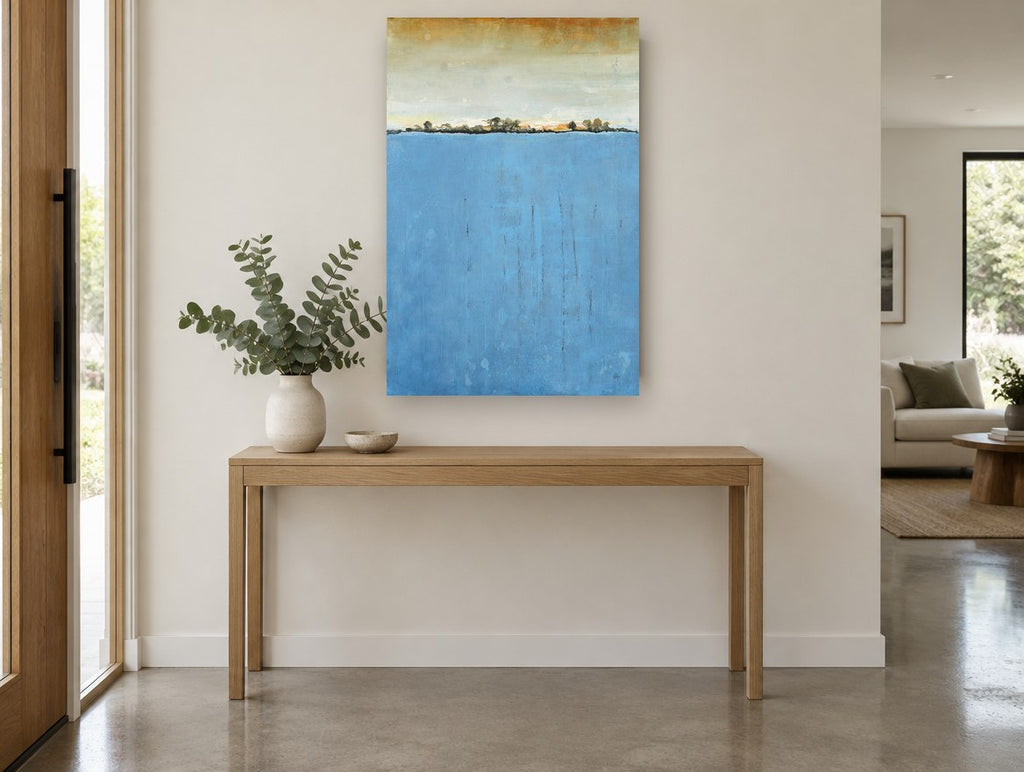 Blue Horizon Line landscape canvas print on the wall of a entry hall