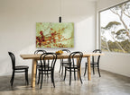 Autumn Vine Rust floral canvas print on the wall of a dining room