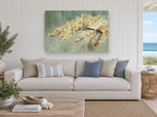 Cream Blossom Bough floral canvas print on the wall of a beach house living room