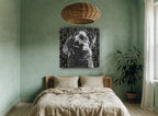 Pensive Black Lab animal canvas print on the wall of a bedroom