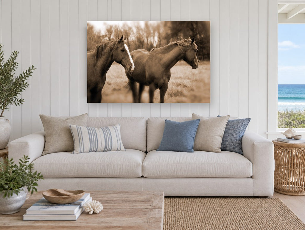 Paddock Companions animal canvas print on the wall of a beach house living room