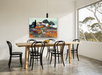 Hillside Farmhouse Blooms vintage canvas print on the wall of a dining room