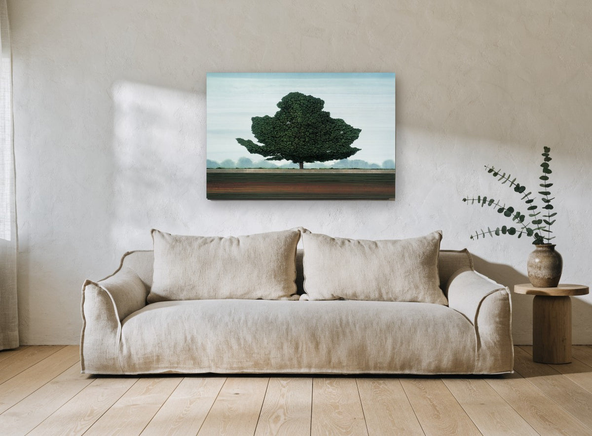 Lone Green Tree floral canvas print on the wall of a living room