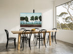 Six Trees at Dusk floral canvas print on the wall of a dining room