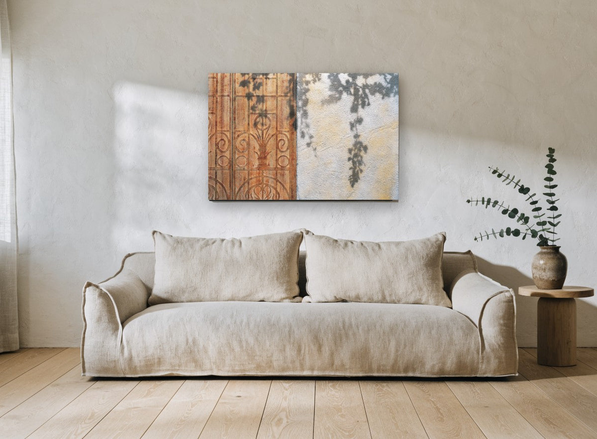 Vine Shadows on Rust floral canvas print on the wall of a living room