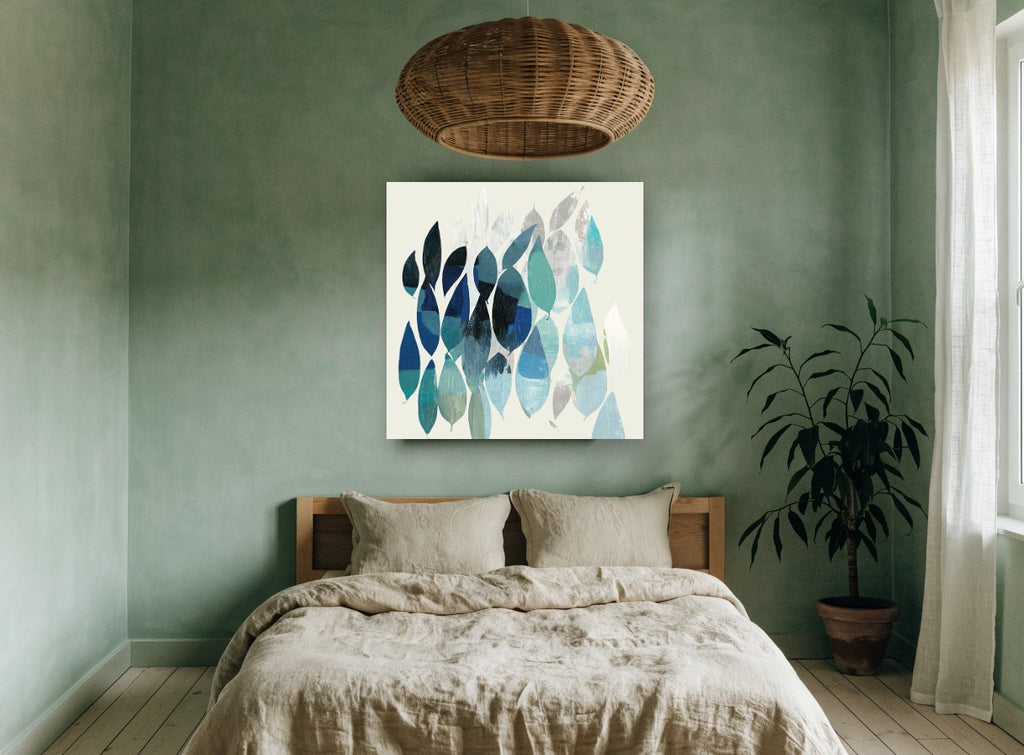 Teal Leaf Drift floral canvas print on the wall of a bedroom