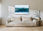 Glacial Teal Shoreline landscape canvas print on the wall of a living room