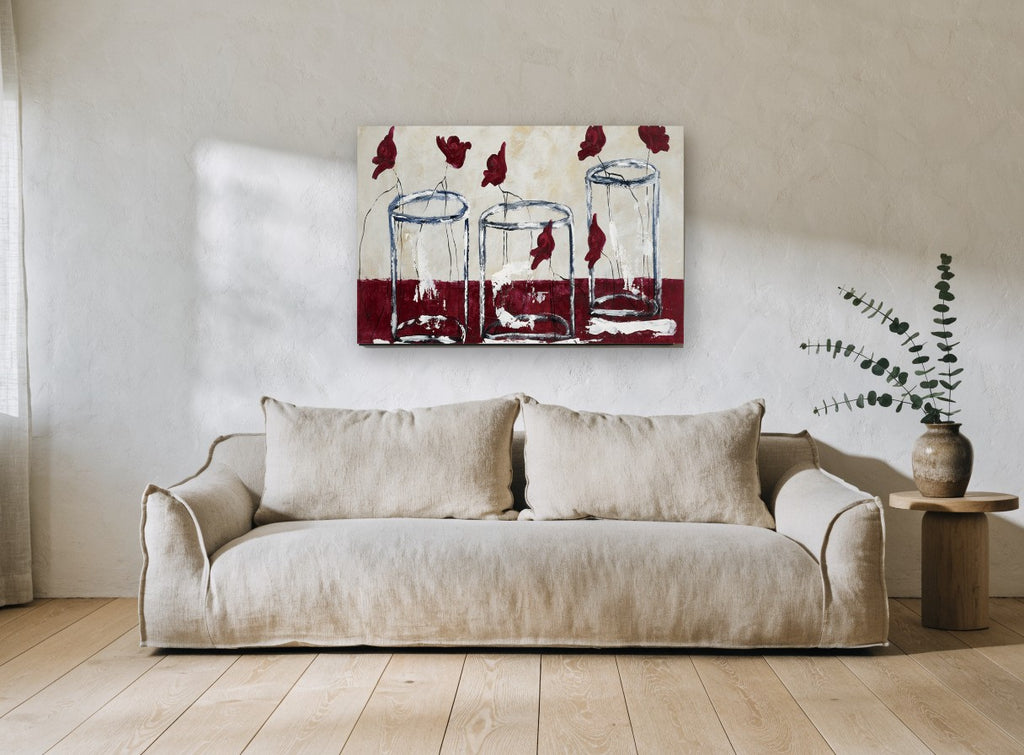 Three Glass Vases floral canvas print on the wall of a living room