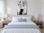 Crimson Poppies in Dark Vase floral canvas print on the wall of a coastal bedroom
