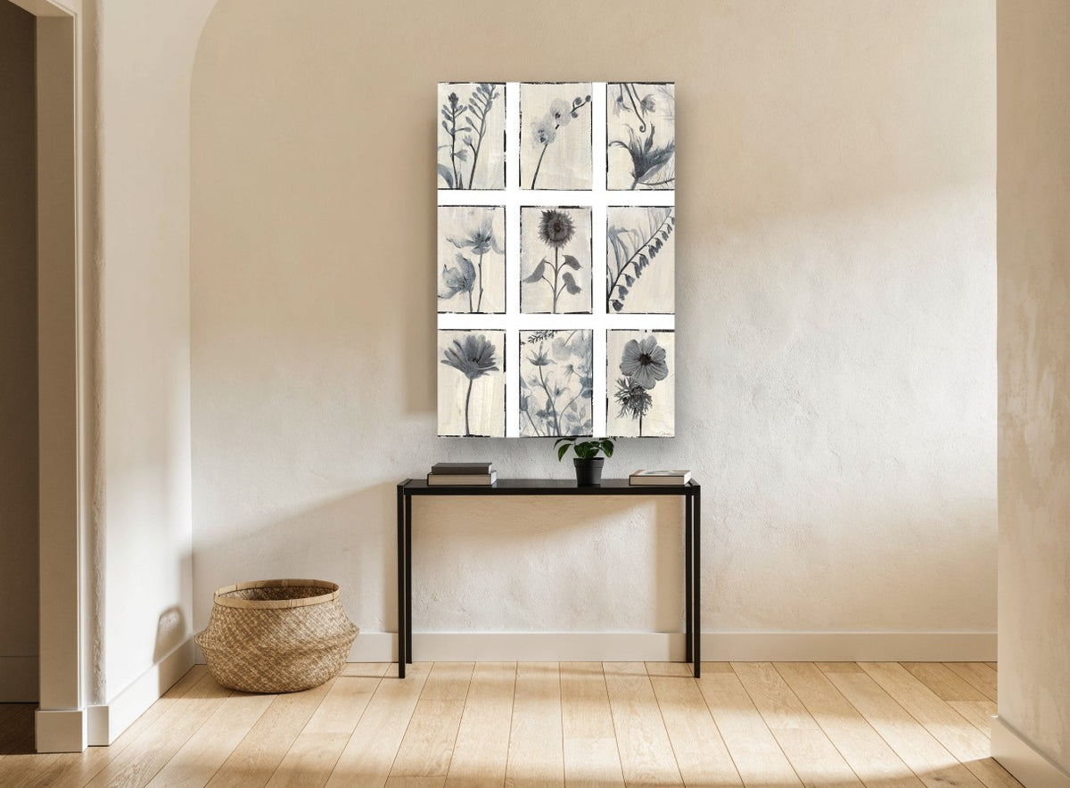 Nine Grey Botanical Panels floral canvas print on the wall of a hallway