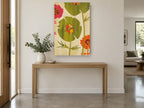 Green Poppy Silhouettes floral canvas print on the wall of a entry hall