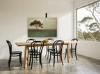 Tree and Migrating Birds floral canvas print on the wall of a dining room