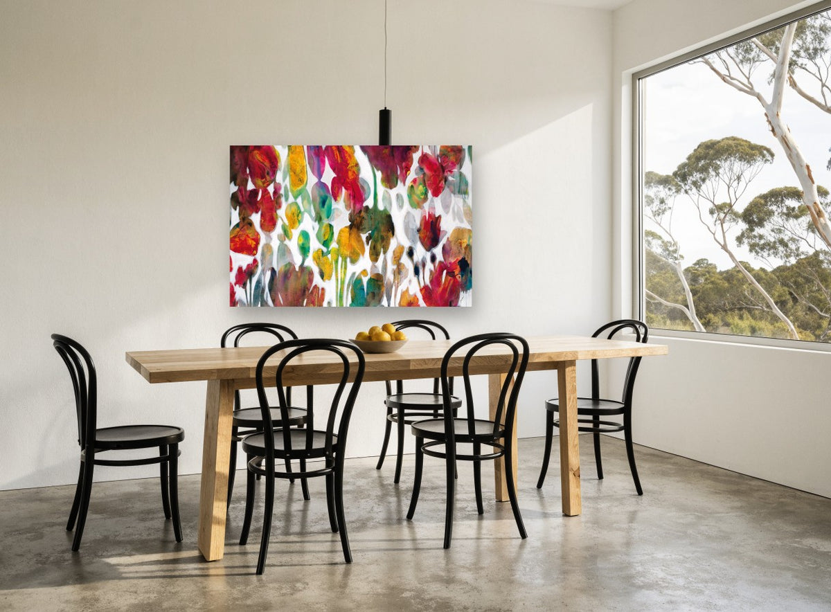 Petal Drift floral canvas print on the wall of a dining room