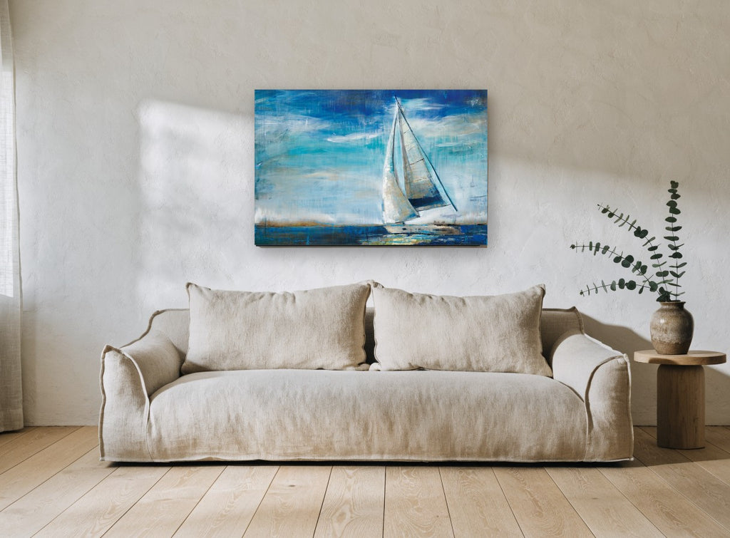 Sails Into Blue coastal canvas print on the wall of a living room